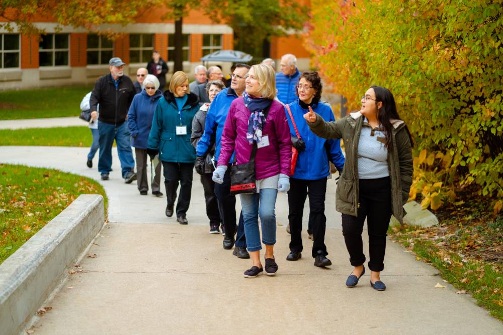 Tour group pointing to Padnos Hall